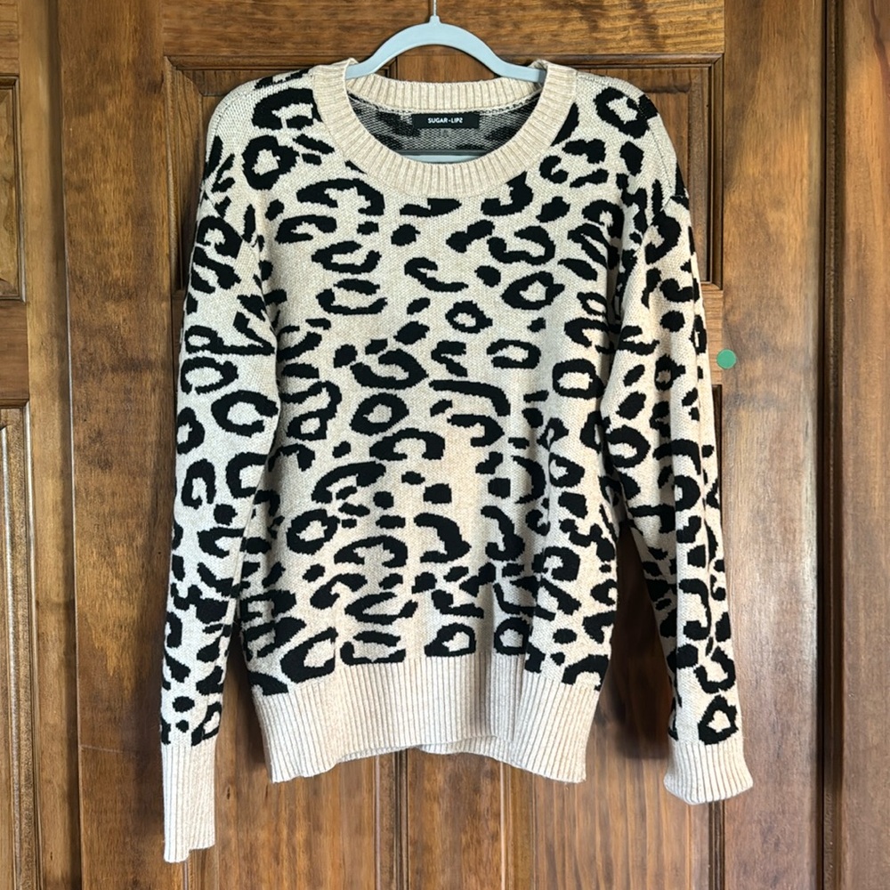 Cheetah print sweater, worn once. Nice and thick from a smoke and pet free home